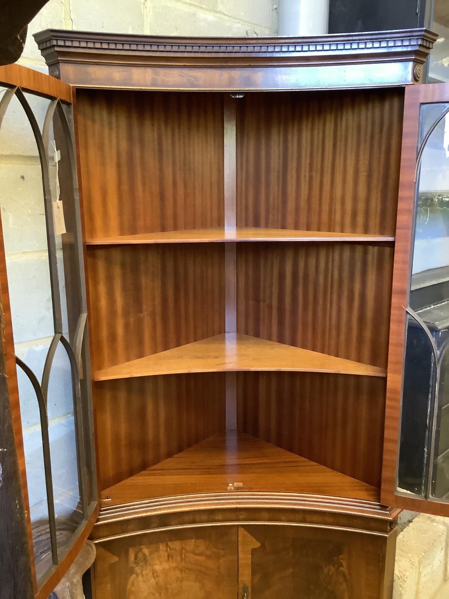 A Georgian style mahogany floor-standing corner display cabinet